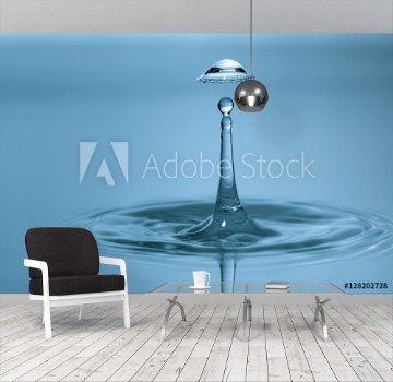 Picture of Water drop falling and drips on water mirror Water drop splash and make perfect circles on surface